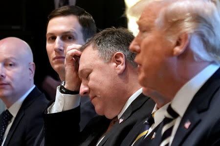 Central Intelligence Agency (CIA) Director Mike Pompeo (C), U.S. President Donald Trump's designee to serve as Secretary of State, sits in with White House senior advisor Jared Kushner as U.S. President Donald Trump welcomes Saudi Arabia's Crown Prince Mohammed bin Salman in the Oval Office at the White House in Washington, U.S. March 20, 2018. REUTERS/Jonathan Ernst