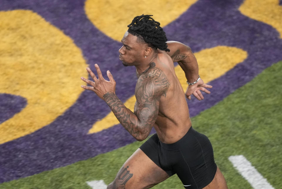 LSU wide receiver Malik Nabers runs the 40-yard dash during LSU's NCAA football pro day in Baton Rouge, La., Wednesday, March 27, 2024. (AP Photo/Gerald Herbert)