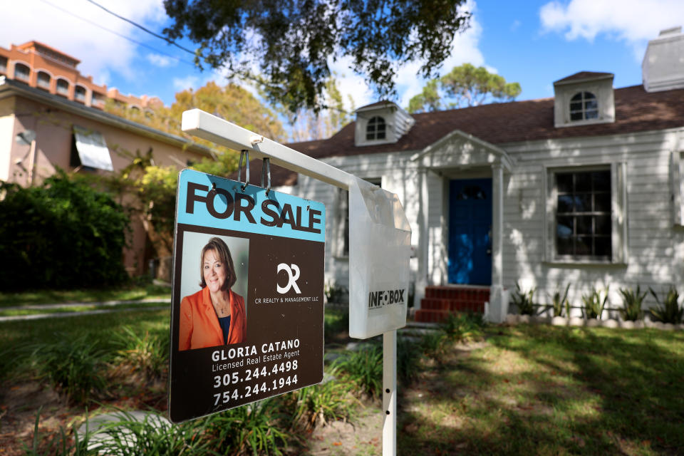 MIAMI, FLORIDA - FEBRUARY 22: A For Sale sign displayed in front of a home on February 22, 2023 in Miami, Florida. US home sales declined in January for the 12th consecutive month as high mortgage rates along with high prices kept people shopping for homes out of the market. It was the weakest home sales activity since 2010. (Photo by Joe Raedle/Getty Images)