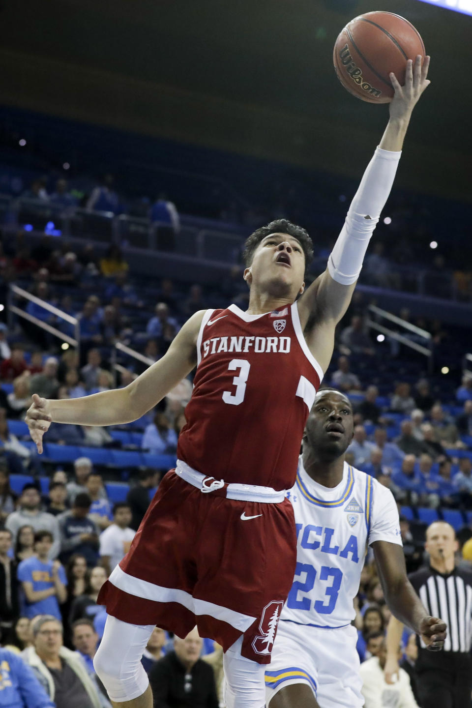 Stanford guard Tyrell Terry shoots as UCLA guard Prince Ali looks on during the first half of an NCAA college basketball game in Los Angeles, Wednesday, Jan. 15, 2020. (AP Photo/Chris Carlson)