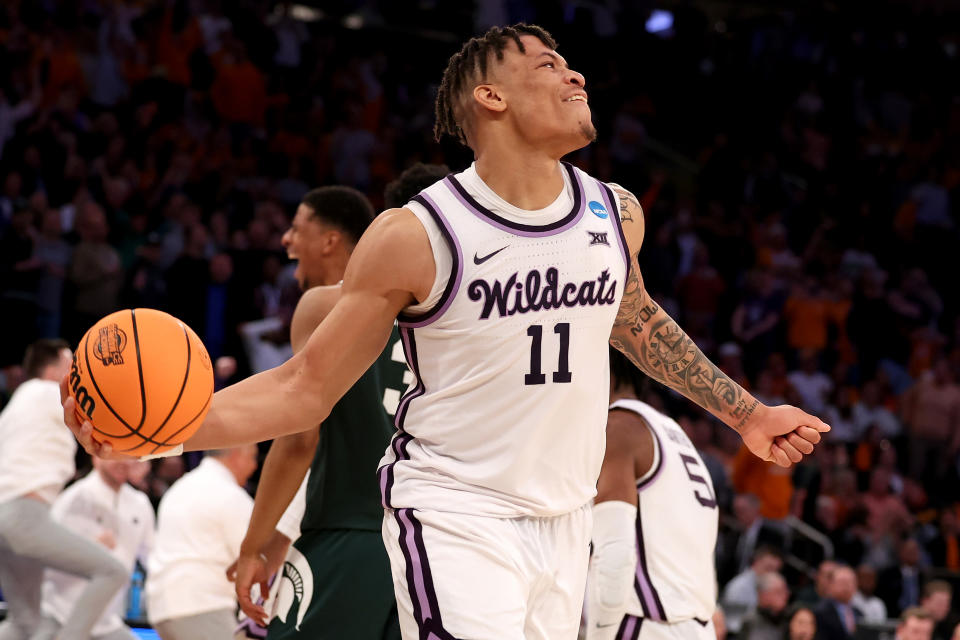 NEW YORK, NEW YORK - MARCH 23: Keyontae Johnson #11 of the Kansas State Wildcats celebrates after defeating the Michigan State Spartans in overtime in the Sweet 16 round game of the NCAA Men's Basketball Tournament at Madison Square Garden on March 23, 2023 in New York City. (Photo by Al Bello/Getty Images)