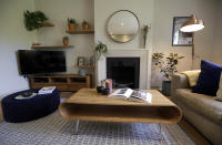 This Friday, Sept. 28, 2018, photo shows the living room of a flat that will be available for short term rent in London. Hotel companies are getting into the business of home-sharing. Marriott has been testing this in London in partnership with a home-sharing company called Hostmaker. (AP Photo/Kirsty Wigglesworth)