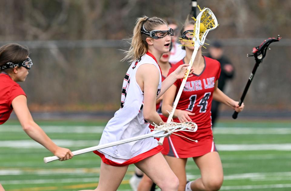 Claire Kayajan of Barnstable moves in for a shot on the Silver Lake Regional goal.