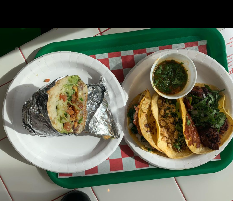 The loaded torta (left) and tacos from Pata Roja, on Court Street, Downtown.