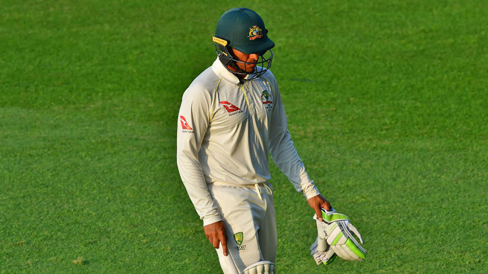 Australia cricketer Usman Khawaja leaves the pitch after being dismissed by Pakistani cricketer Muhammed Abbas. Pic: Getty