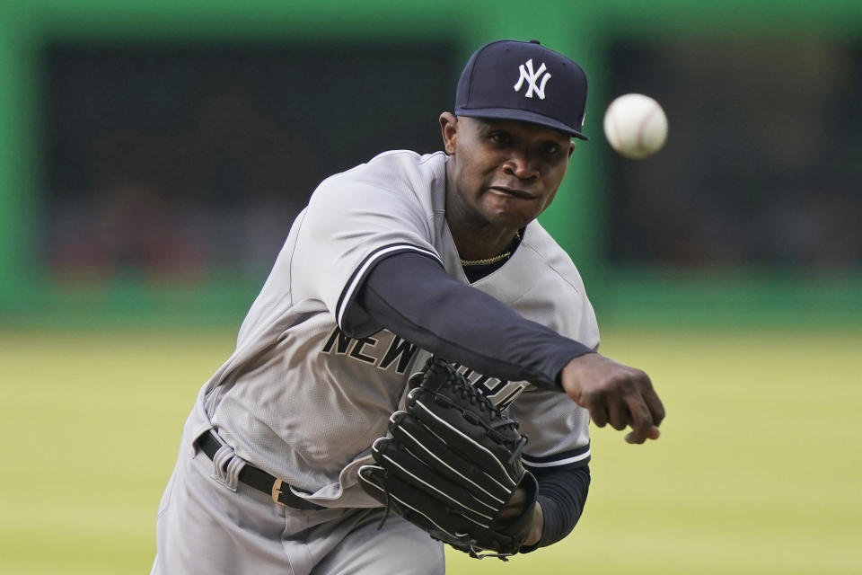 New York Yankees starting pitcher Domingo German delivers in the first inning of a baseball game against the Cleveland Indians, Thursday, April 22, 2021, in Cleveland. (AP Photo/Tony Dejak)
