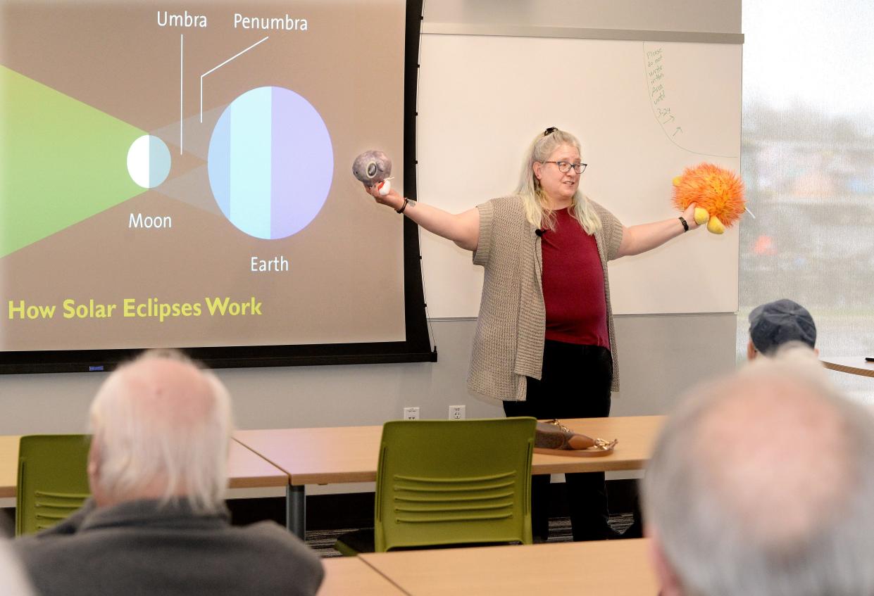 Lincoln Land Community College geology professor Samantha Reif addresses the Academy of Lifelong Learners at Lincoln Land Community College on Thursday, March 21, 2024, about the April 8 total solar eclipse. It is the second such eclipse to pass through Illinois in a little less than seven years.
