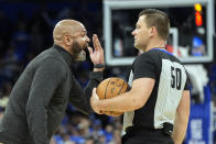 Cleveland Cavaliers head coach J.B. Bickerstaff, left, argues a ruling with referee Gediminas Petraitis (50) during the second half of Game 6 of an NBA basketball first-round playoff series, Friday, May 3, 2024, in Orlando, Fla. (AP Photo/John Raoux)