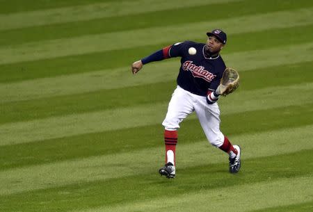 Oct 25, 2016; Cleveland, OH, USA; Cleveland Indians center fielder Rajai Davis catches a fly ball hit by Chicago Cubs pinch hitter Willson Contreras (not pictured) in the 7th inning in game one of the 2016 World Series at Progressive Field. Mandatory Credit: David Richard-USA TODAY Sports