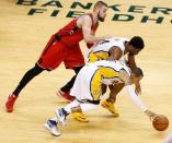 Apr 29, 2016; Indianapolis, IN, USA; Indiana Pacers guard Monta Ellis (11) reaches for the ball in front of Toronto Raptors center Jonas Valanciunas (17) during the second half in game six of the first round of the 2016 NBA Playoffs at Bankers Life Fieldhouse. Mandatory Credit: Brian Spurlock-USA TODAY Sports