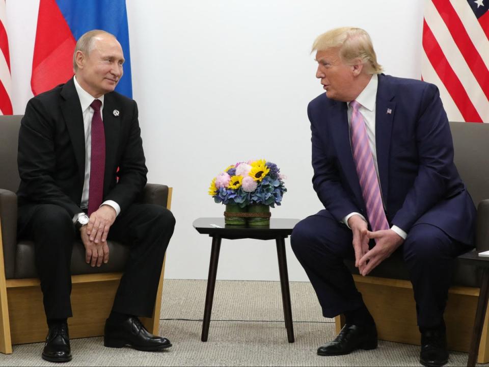 Russian President Vladimir Putin and US President Donald Trump hold a meeting on the sidelines of the G20 summit in Osaka on June 28, 2019 (SPUTNIK/AFP via Getty Images)