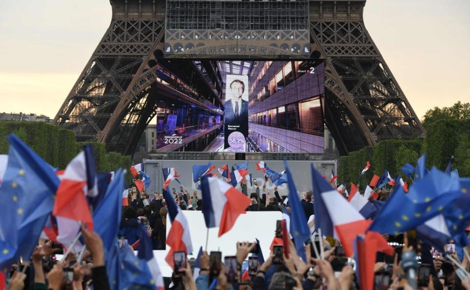 Supporters react after the victory of French President Macron (AFP via Getty Images)