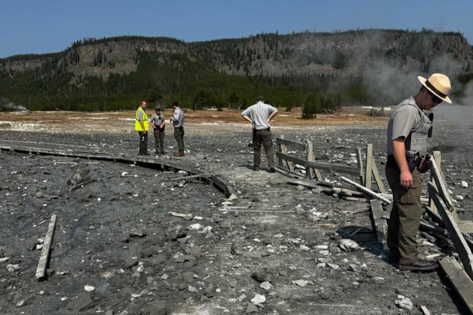 Park staff assess the damage to Biscuit Basin boardwalks after a hydrothermal explosion at Yellowstone National Park in Wyoming on July 23, 2024.  / Credit: National Park Service