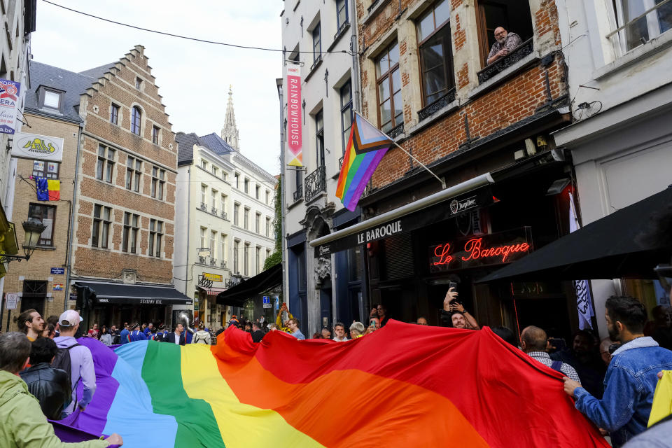 People carry a big rainbow flag in the streets of Brussels' city center for the kick-off of the Belgian Pride also called gay pride in Brussels, Belgium, 05 May 2022.