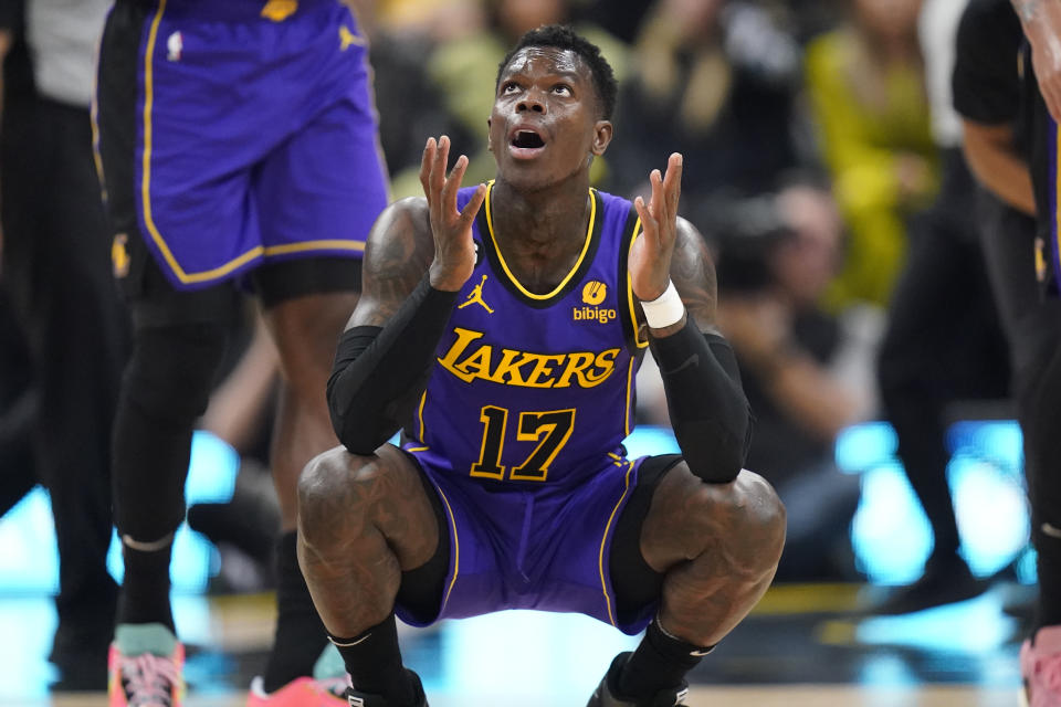 Los Angeles Lakers guard Dennis Schroder (17) reacts to a foul called against him during the first half of the team's NBA basketball game with the Utah Jazz on Tuesday, April 4, 2023, in Salt Lake City. (AP Photo/Rick Bowmer)