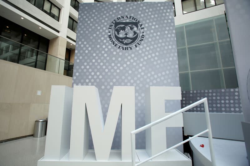 FILE PHOTO: International Monetary Fund logo is seen inside the headquarters at the end of the IMF/World Bank annual meetings