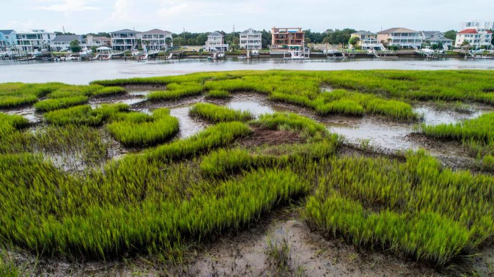 The N.C. Coastal Federation will receive $30 million as part of an EPA grant to restore coastal habitats like salt marshes, which sequester greenhouse gases. This drone photograph shows a salt marsh in Wrightsville Beach in 2021.