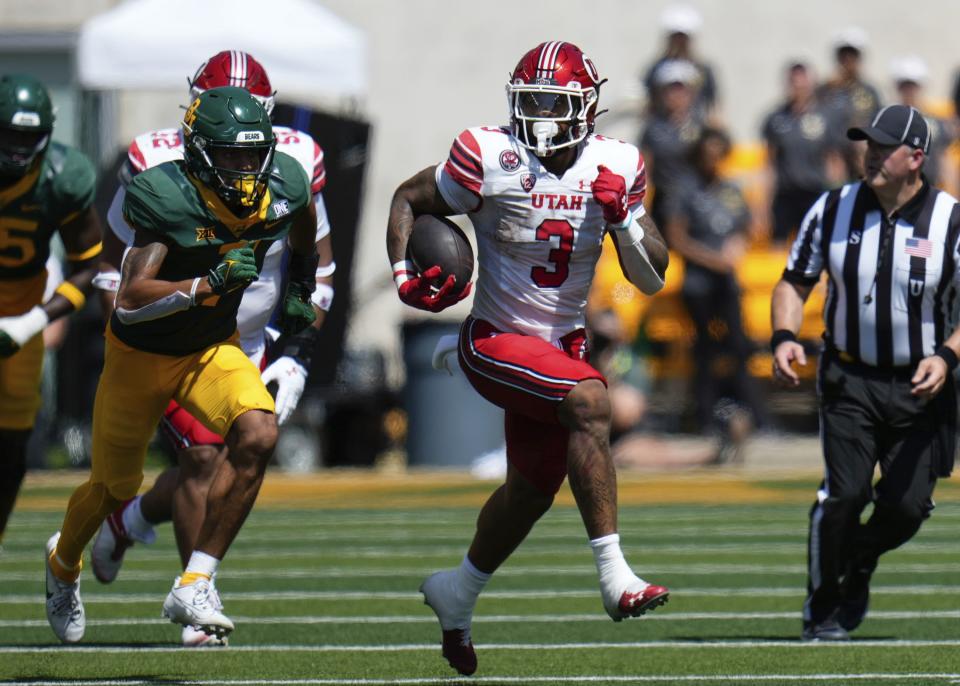 Utah running back Ja’Quinden Jackson breaks free for a 44-yard run as Baylor Bears safety Bryson Jackson looks on in the first half of an NCAA college football game, Saturday, Sept. 9, 2023, in Waco, Texas. (Chris Jones/Waco Tribune-Herald via AP) | AP