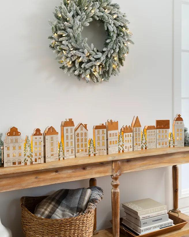 <p><a href="https://go.redirectingat.com?id=74968X1596630&url=https%3A%2F%2Fwww.balsamhill.com%2Fp%2Flit-wooden-christmas-old-town-decoration&sref=https%3A%2F%2Fwww.housebeautiful.com%2Fentertaining%2Fholidays-celebrations%2Fg45836744%2Fbeautiful-christmas-village-sets%2F" rel="nofollow noopener" target="_blank" data-ylk="slk:Shop Now;elm:context_link;itc:0;sec:content-canvas" class="link ">Shop Now</a></p><p>Lit Wooden Christmas Olde Town</p><p>balsamhill.com</p><p>$69.00</p>