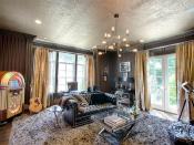 <p>This room is known as the "man cave" and has everything from a lounge area to a pool table and flat-screen television.</p>