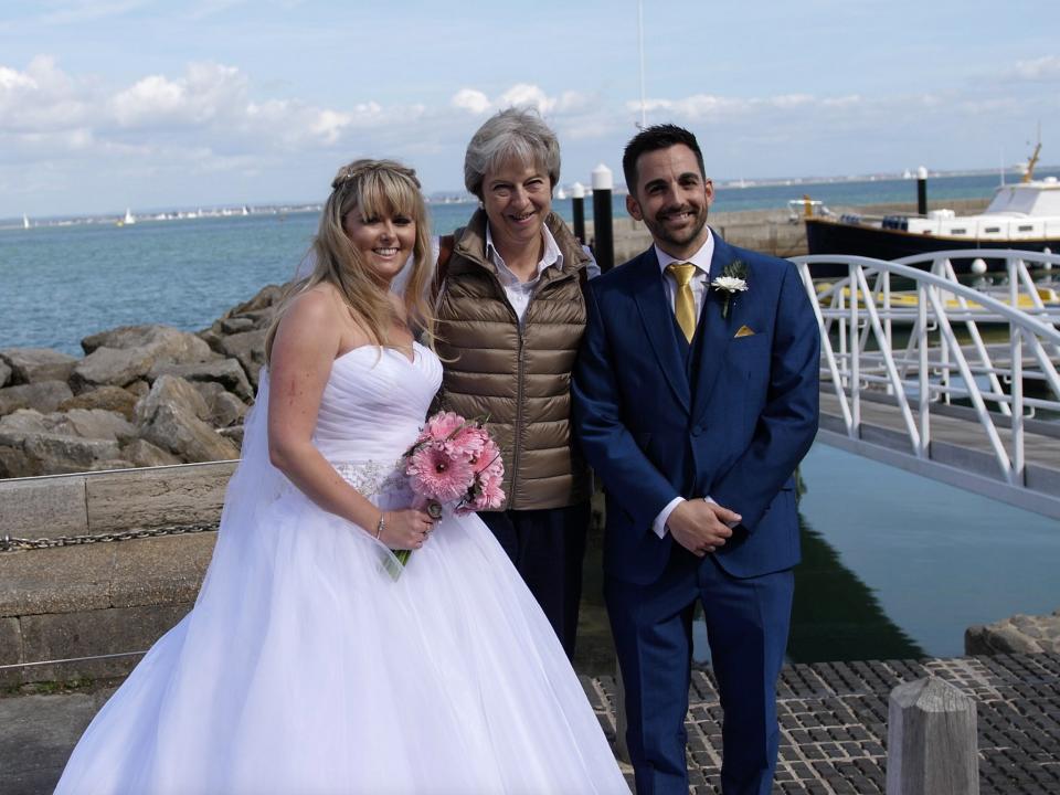 Theresa May poses with Michelle and Jason Dight: Solent News and Photo Agency