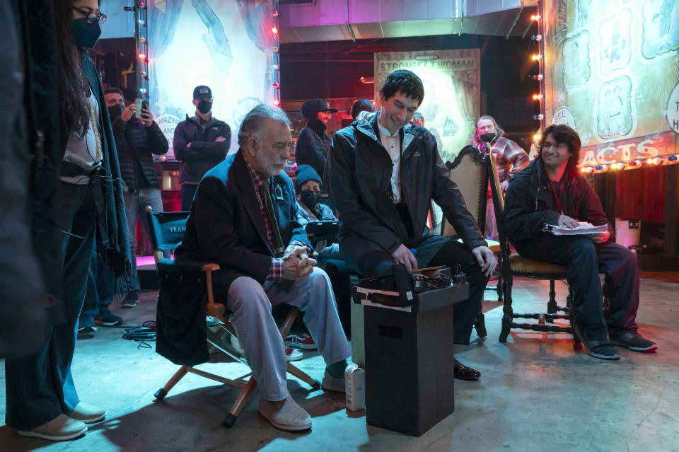 This image released by Lionsgate shows writer/director Francis Ford Coppola, left, and actor Adam Driver on the set of 