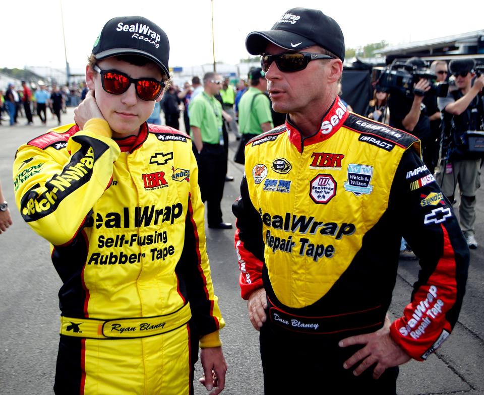 Ryan Blaney talks with his dad, NASCAR driver Dave Blaney, in 2012.