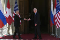 Russian President Vladimir Putin, left, and U.S President Joe Biden shake hands during their meeting at the 'Villa la Grange' in Geneva, Switzerland in Geneva, Switzerland, Wednesday, June 16, 2021. (AP Photo/Alexander Zemlianichenko, Pool)