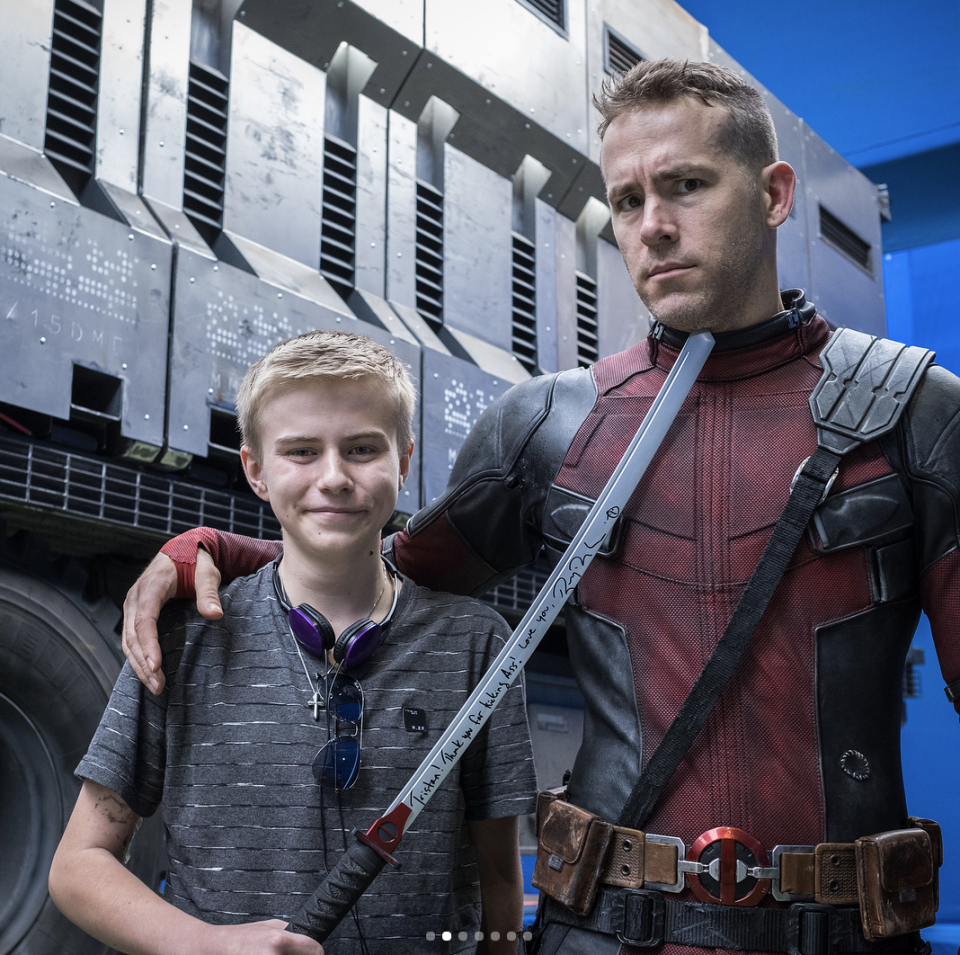<p>“One of the best parts of playing the Big Red Jackass is welcoming @makeawishamerica and @childrenswishfoundation onto set,” the kind-hearted actor captioned a series of shots with the kids. “Deadpool kicked Cancer in the taint, but these kids do it for real every day. These foundations make dreams come true for a lot of of super-brave kids. They also make dreams come true for parents, who just wanna see their kid smile,” he continued. “HUGE thanks to our Prop Master, Dan Sissons, for making sure every kid left with his/her own sword. (Bamboo versions. Not stabby-stabby versions.)” (Photo: <a rel="nofollow noopener" href="https://www.instagram.com/p/BfYdMUnD9tG/?taken-by=vancityreynolds" target="_blank" data-ylk="slk:Ryan Reynolds via Instagram;elm:context_link;itc:0;sec:content-canvas" class="link ">Ryan Reynolds via Instagram</a>) </p>