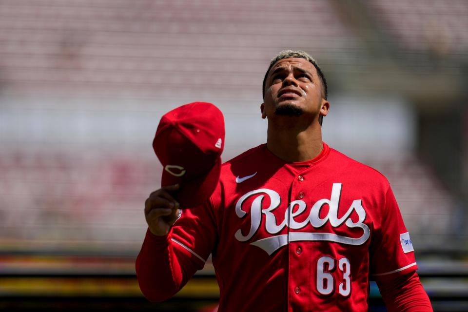 Cincinnati Reds releif pitcher Fernando Cruz (63) looks to the sky after pitching a scoreless top of the sixth inning of the MLB Interleague game between the Cincinnati Reds and the Tampa Bay Rays at Great American Ball Park in downtown Cincinnati on Wednesday, April 19, 2023.