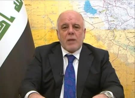 Iraq's Prime Minister Haiber al-Abadi announces the start of an offensive to retake the western side of Mosul as troops begin to move towards Islamic State, in this still image from video by Iraqiya TV February 19, 2017. Iraqiya TV/via Reuters TV