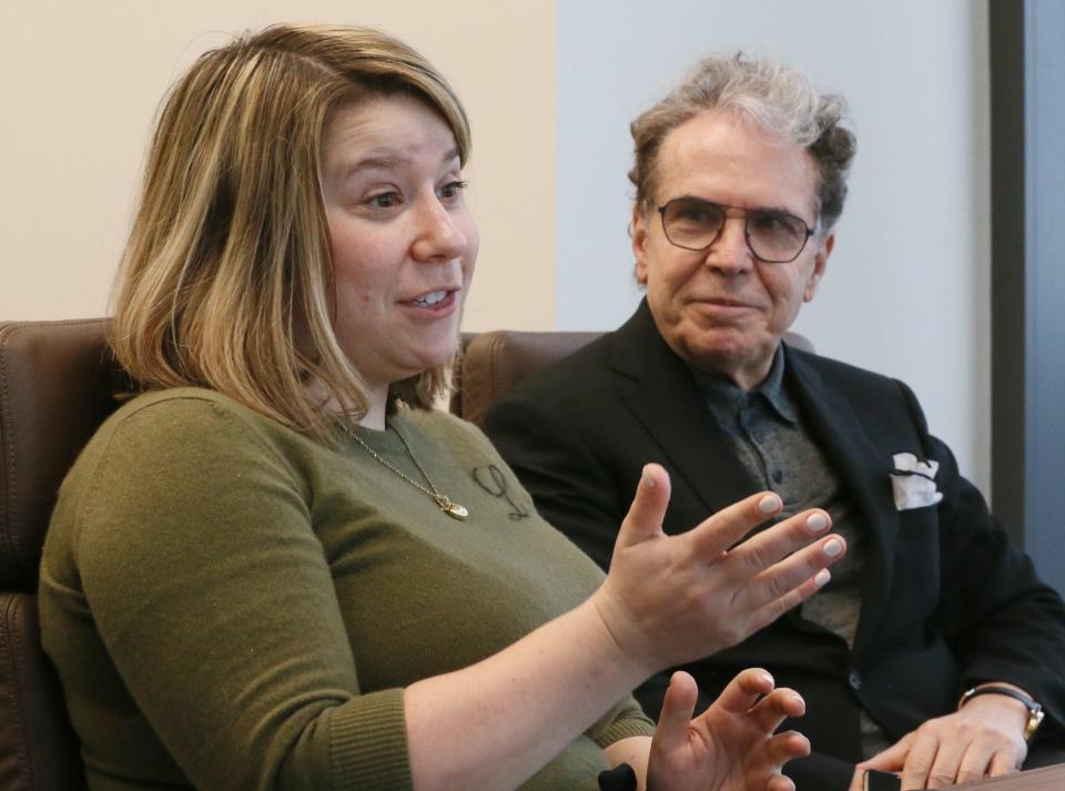 Lidia Mowad, left, an associate at the Benesch law firm, and Mark Avsec, a partner with the firm, say Megan Parker is doing a great job at the firm. Parker worked at Benesch in the summer during law school before joining the firm after passing the bar exam.