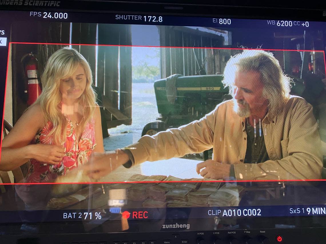 Katie Amess and Jeff Fahey in a scene being shot in the Beaufort area for the film “Final Load.”