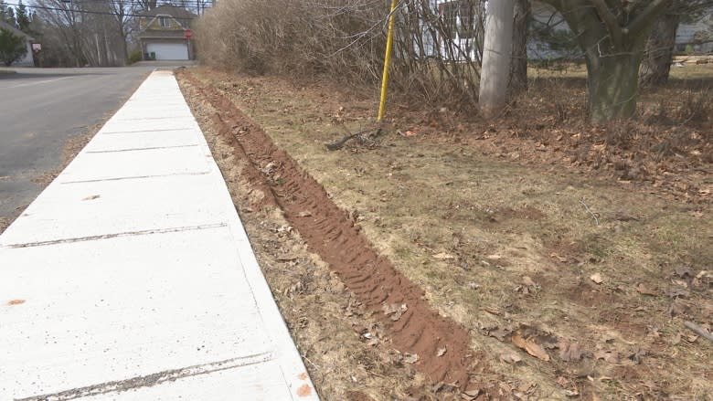 Cruel April, clad in scars of winter: Melt reveals snowplow damage