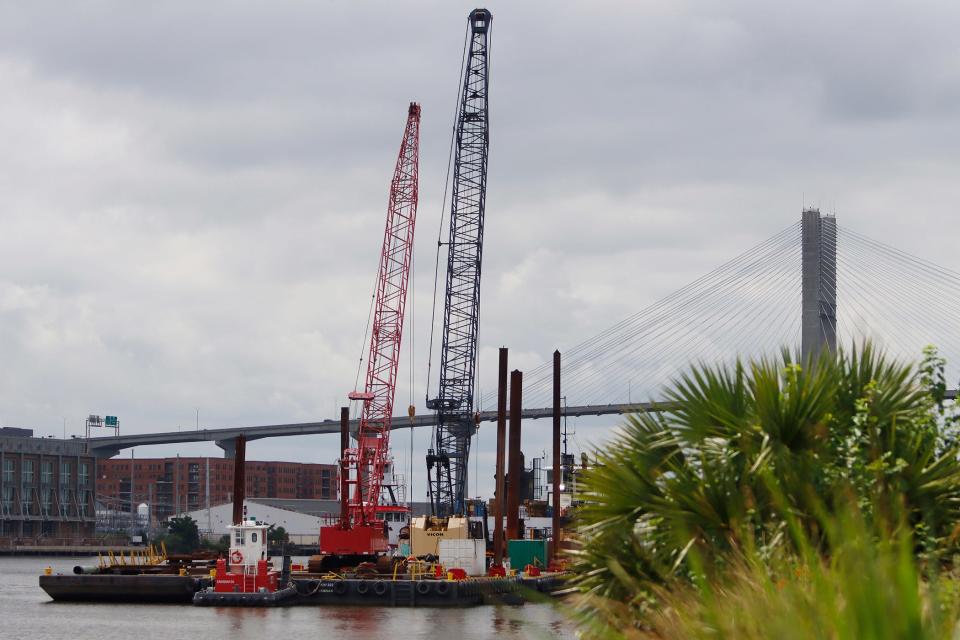 Cranes are anchored by the shore on Hutchinson Island in Savannah, GA Wednesday, Aug. 4, 2021. 