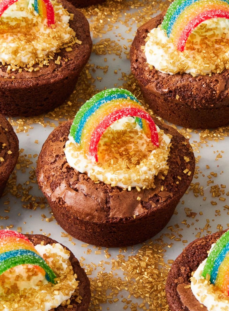 <p>If the end of the rainbow led to these <a href="https://www.delish.com/cooking/recipe-ideas/g40394832/mini-dessert-recipes/" rel="nofollow noopener" target="_blank" data-ylk="slk:mini desserts;elm:context_link;itc:0;sec:content-canvas" class="link ">mini desserts</a>, honestly we wouldn't be disappointed in the slightest. They're made from box brownie mix (although you can make <a href="https://www.delish.com/cooking/recipe-ideas/recipes/a51007/homemade-brownie-recipe/" rel="nofollow noopener" target="_blank" data-ylk="slk:homemade brownies;elm:context_link;itc:0;sec:content-canvas" class="link ">homemade brownies</a> if you prefer), then decorated with <a href="https://www.delish.com/cooking/recipe-ideas/a24492200/how-to-make-homemade-whipped-cream/" rel="nofollow noopener" target="_blank" data-ylk="slk:whipped cream;elm:context_link;itc:0;sec:content-canvas" class="link ">whipped cream</a> "clouds," a candy rainbow belt, and gold sprinkles. Have fun with it!</p><p>Get the <strong><a href="https://www.delish.com/cooking/recipe-ideas/a58553/pot-o-gold-cups-recipe/" rel="nofollow noopener" target="_blank" data-ylk="slk:Pot O' Gold Cups recipe;elm:context_link;itc:0;sec:content-canvas" class="link ">Pot O' Gold Cups recipe</a></strong>.</p>