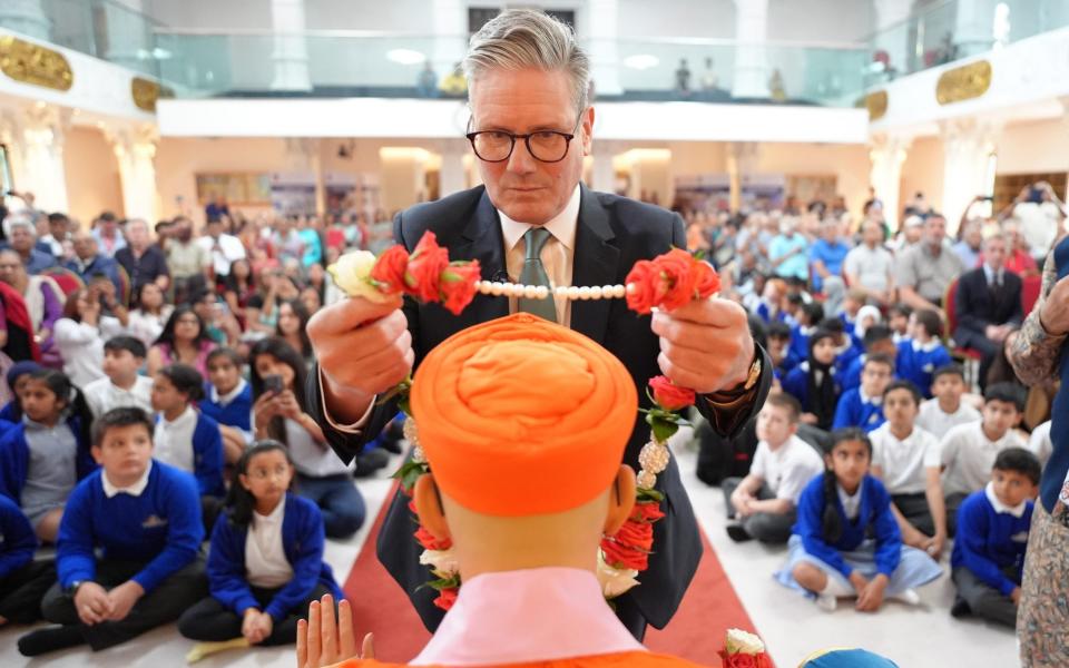 Sir Keir Starmer during a visit to the Shree Swaminarayan Mandir Kingsbury in London