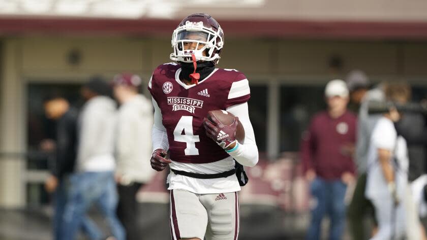 Mississippi State cornerback DeCarlos Nicholson (4) runs the ball upfield during pregame drills of an NCAA college football game against East Tennessee State in Starkville, Miss., Saturday, Nov.19, 2022. Mississippi State won 56-7. (AP Photo/Rogelio V. Solis)