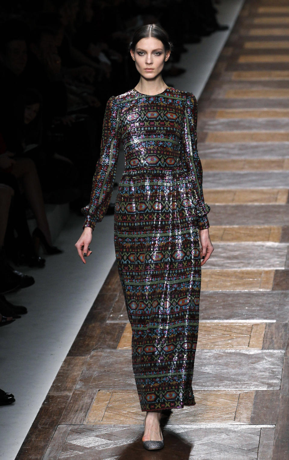 A model wears a creation by Maria Grazia Chiuri and Pier Paolo Piccioli for Valentino as part of the Fall-Winter, ready-to-wear 2013 fashion collection, during Paris Fashion week, Tuesday, March. 6, 2012. (AP Photo/Christophe Ena)