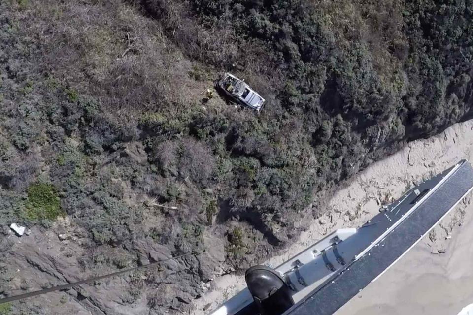 <p>CHP - Coastal Division Air Operations/Facebook</p> Man rescued two days after driving his car off a cliff in California.