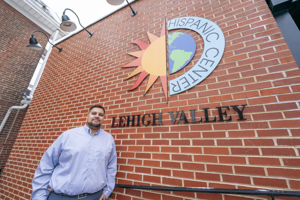 Raymond Santiago, executive director, Hispanic Center Lehigh Valley, poses for a photo during an interview, Thursday, Jan. 18, 2024, in Bethlehem, Penn. President Joe Biden is warning that Donald Trump will be a grave threat to American democracy if he wins re-election, but interviews with Pennsylvania voters again suggest it's not resonating. Santiago sees the recent 38% rise in use of the organization's food pantry as a stark sign of something he has felt over the past couple years: Many in the area's Latino community are struggling to meet their basic needs. (AP Photo/Chris Szagola)