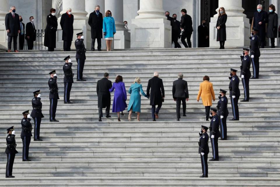 Joe Biden with Jill Biden, and Kamala Harris with her husband Doug Emhoff, at the Capitol. Roy Blunt and Amy Klobuchar are also in attendance.