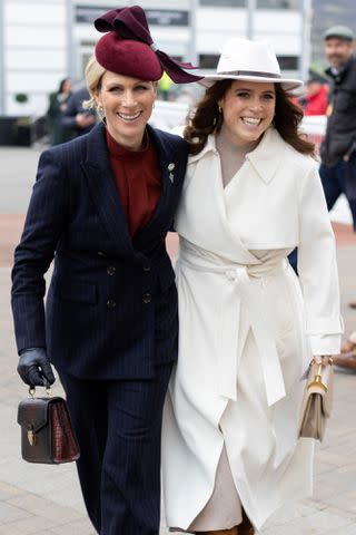 <p>Shutterstock</p> Zara Tindall and Princess Eugenie at the Cheltenham Festival on March 13, 2024