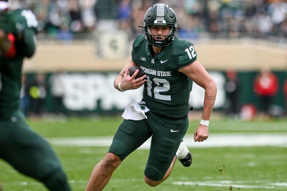 Michigan State's Katin Houser runs for a gain against Nebraska during the second quarter on Saturday, Nov. 4, 2023, at Spartan Stadium in East Lansing.
