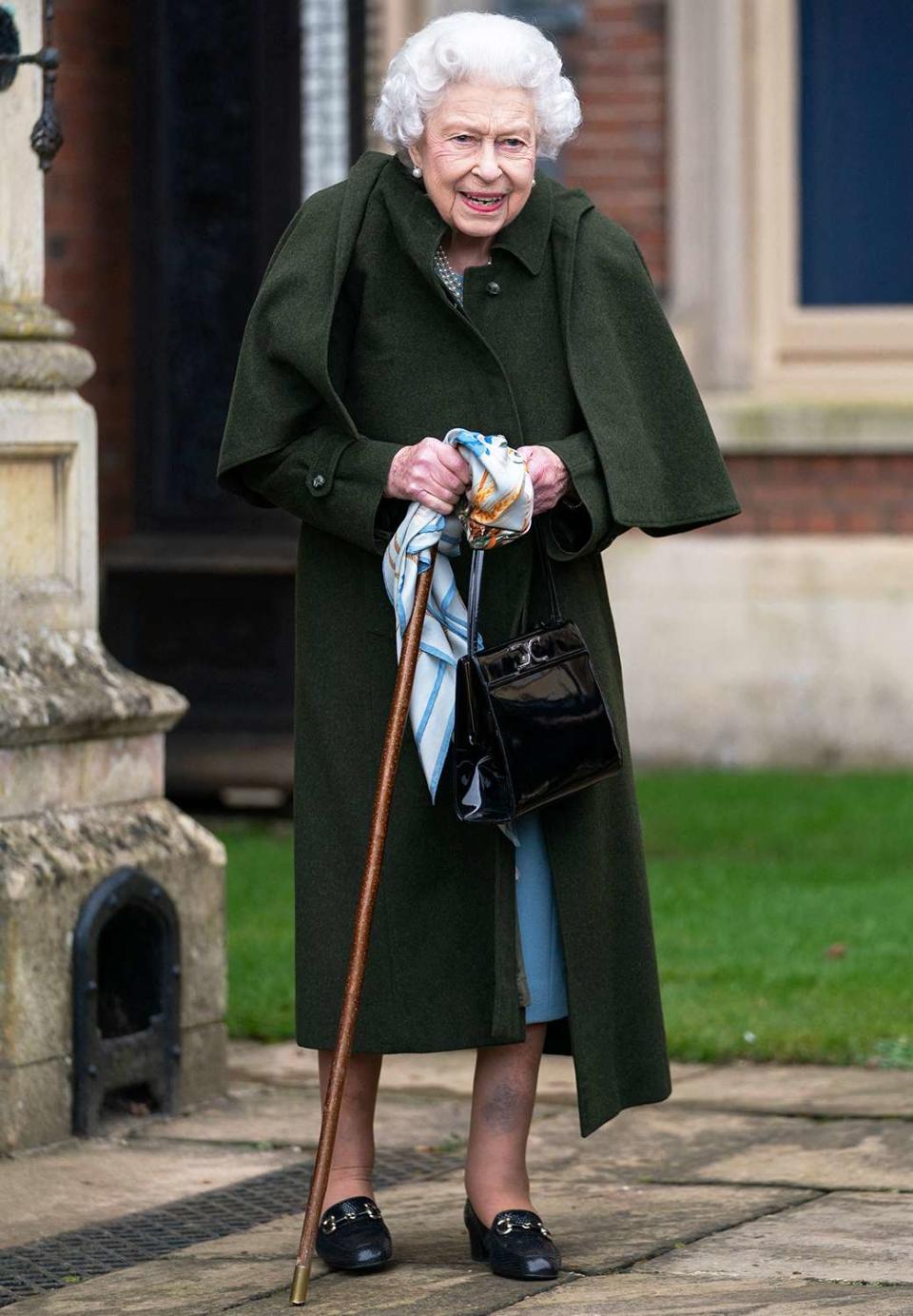 Britain's Queen Elizabeth II leaves Sandringham House, the Queen's Norfolk residence, after a reception with representatives from local community groups to celebrate the start of the Platinum Jubilee on February 5, 2022.