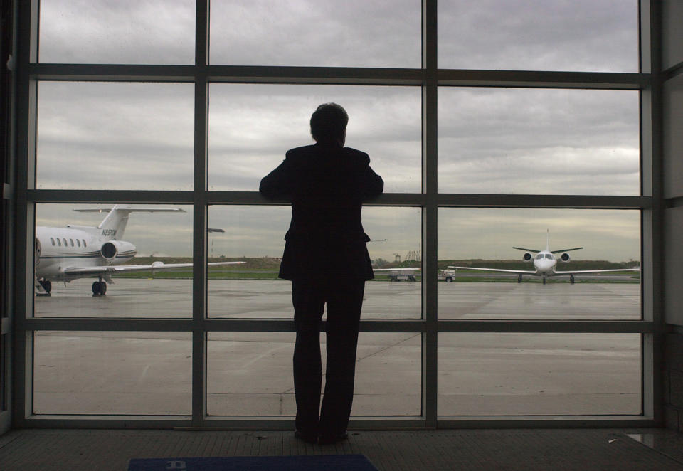 <p>Sen. Arlen Specter, R-Pa., looks out toward the tarmac at the executive terminal of Philadelphia International Airport as he waits to board a plane while campaigning one day before Pennsylvania’s Republican primary on April 26, 2004. (Photo: Jacqueline Larma/AP) </p>