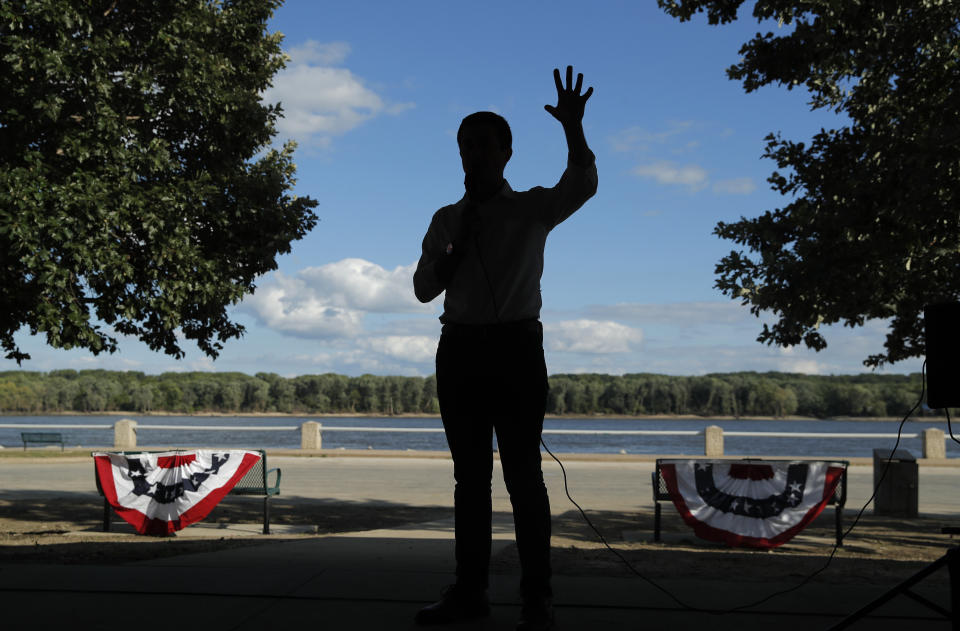 FILE - In this Aug. 14, 2019, file photo, Democratic presidential candidate South Bend Mayor Pete Buttigieg speaks at a campaign event along the Mississippi River in Keokuk, Iowa. Buttigieg is making a faith-based appeal to Democratic voters as he tries to demonstrate his party’s religiosity. (AP Photo/John Locher, File)