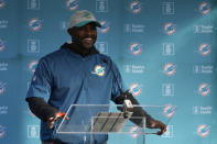 Brian Flores Head Coach of the Miami Dolphins speaks to the press during a practice and media availability by the Miami Dolphins In Ware, England, Friday, Oct. 15, 2021. The Dolphins play the Jaguars in a regular season NFL game on Sunday at Tottenham Hotspurs White Hart Lane stadium in London. (AP Photo/Alastair Grant)