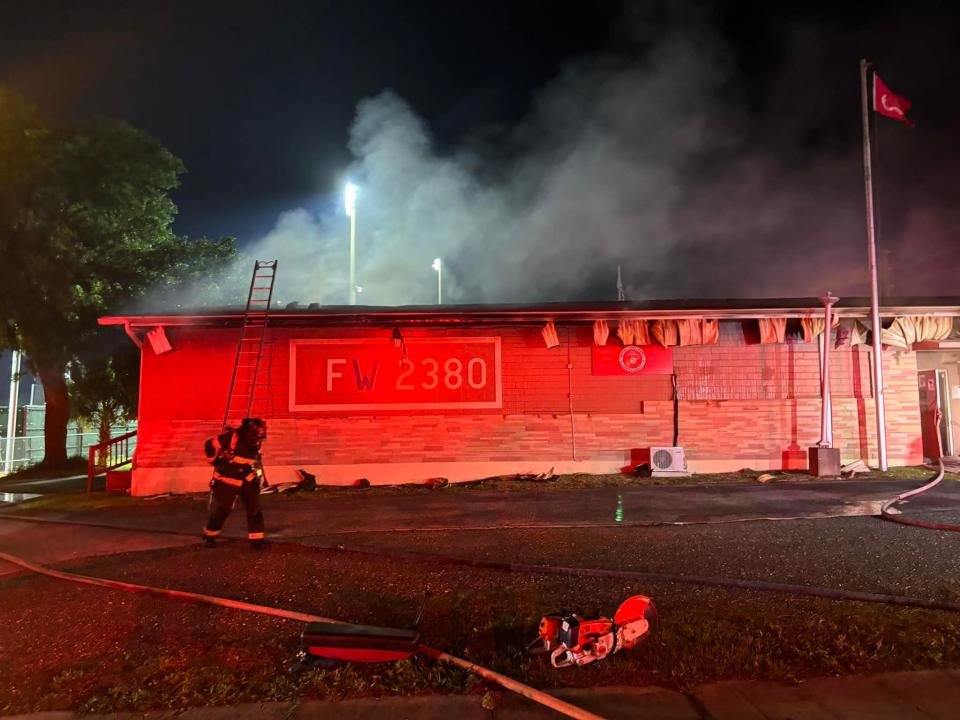 DeLand firefighters battle a blaze at the Veterans of Foreign War Post 2380, at 510 S. Alabama Ave., near Spec Martin Stadium. No one was hurt.