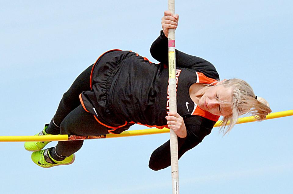 Quincy Olivier of Ipswich attempts to clear the bar in the girls' pole vault during the Pat Gilligan Alumni track and field meet on Tuesday, April 25, 2023 in Estelline.